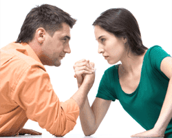 man and woman arm wrestling to decide child custody modifications in Texas