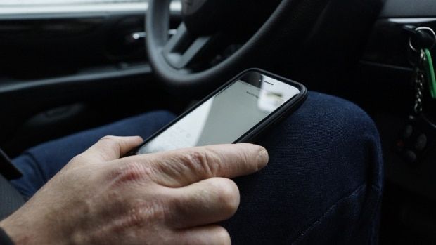 Man holding his phone.