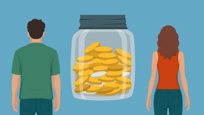 money jar in the middle of a man and a woman
